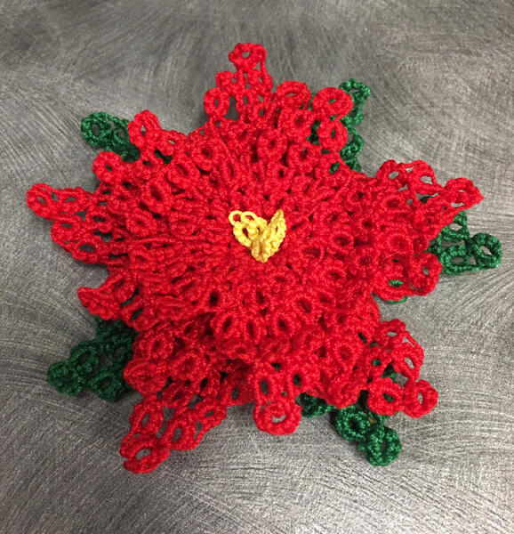 Instructor Shawna Wachs translated the turkish oya poinsettia pattern to tatting patterns.