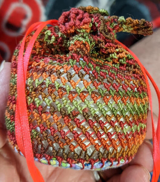 Donna&#39;s knotted lace bags. She gets a lot of practice with tension.