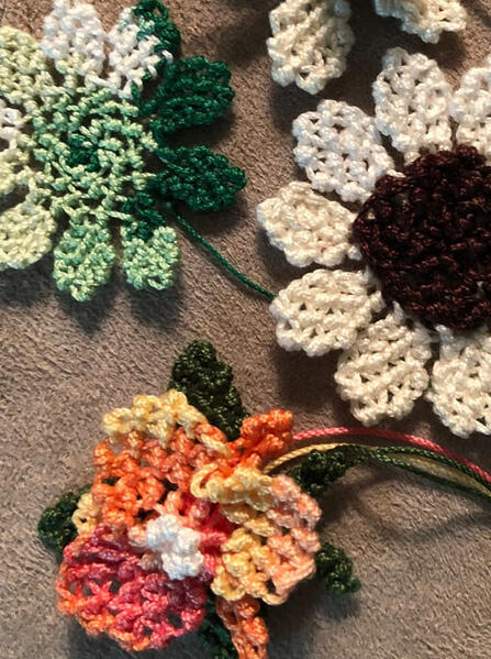 Marsha's thai orchid, sunflower, and daffodil. Patterns from the intermediate class at Tatting Corner, Anderson, IN.