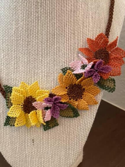Leena's beautiful anniversary necklace using the sunflower pattern.