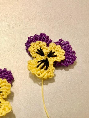 Paula Harten&#39;s small violas from the intermediate virtual class with the Lace Museum. She is a board member of the Lace Museum and enjoys bobbin lace, needle lace, and finger lace.